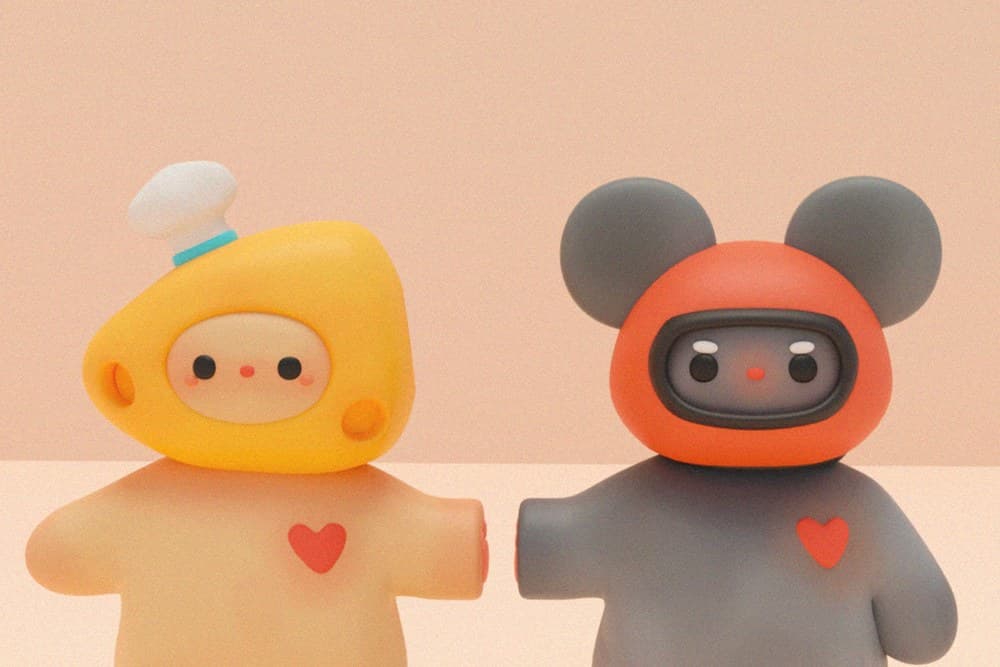 3D figurines dressed as a blueberry, strawberry, and banana