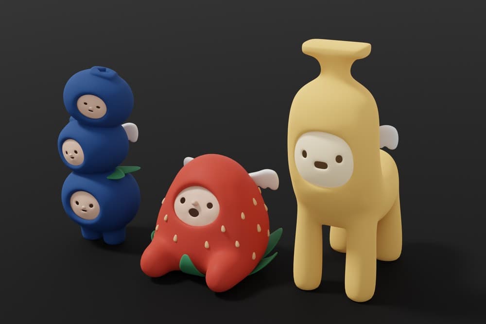 3D figurines in a cheese hat and a mouse helmet